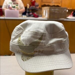Stylish Cream Cap with Gold Accents